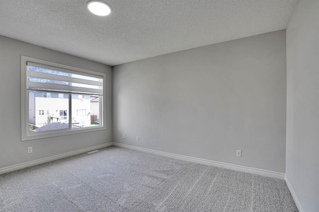 117 Hawkmere Place, Chestermere, AB - Indoor Photo Showing Other Room