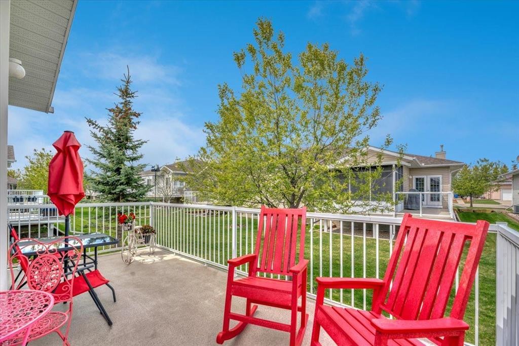 141 Ridgestone Lane, Diamond Valley, AB - Outdoor With Deck Patio Veranda