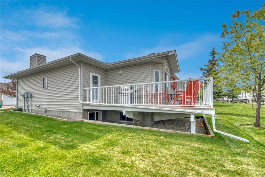 141 Ridgestone Lane, Diamond Valley, AB - Outdoor With Deck Patio Veranda