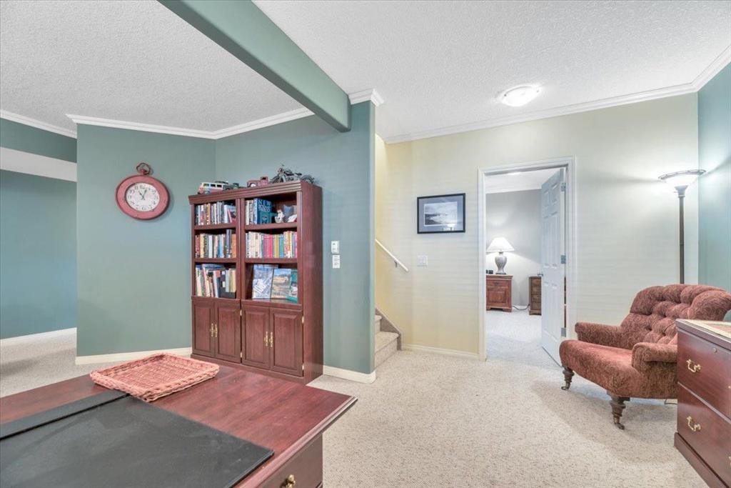 141 Ridgestone Lane, Diamond Valley, AB - Indoor Photo Showing Other Room