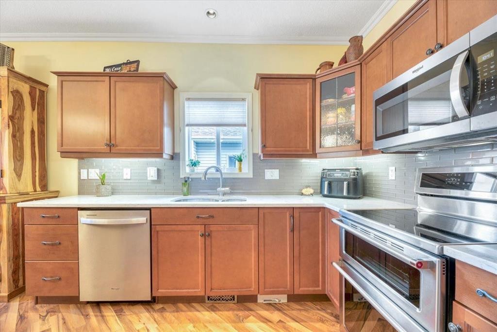 141 Ridgestone Lane, Diamond Valley, AB - Indoor Photo Showing Kitchen