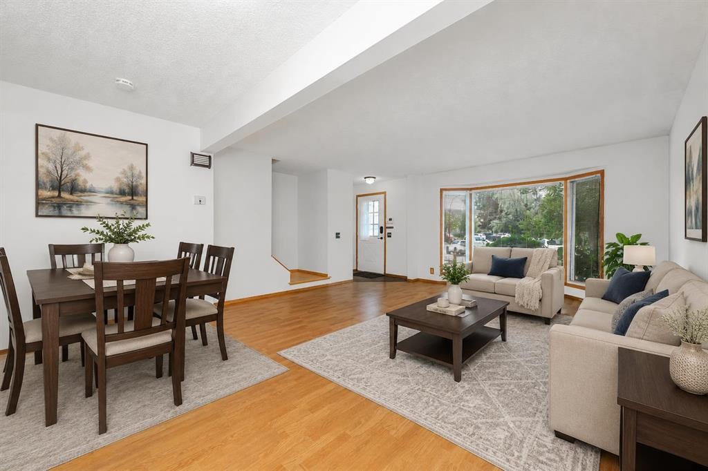 78 Queen Anne Close Se, Calgary, AB - Indoor Photo Showing Living Room