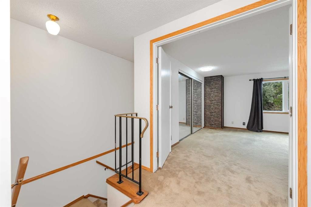 78 Queen Anne Close Se, Calgary, AB - Indoor Photo Showing Other Room