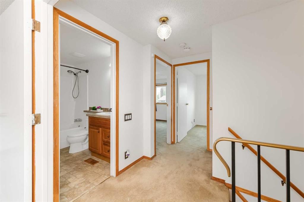 78 Queen Anne Close Se, Calgary, AB - Indoor Photo Showing Other Room