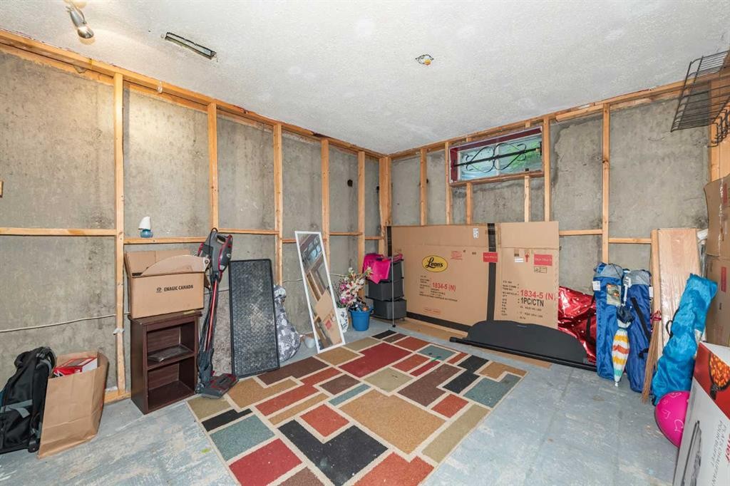 78 Queen Anne Close Se, Calgary, AB - Indoor Photo Showing Basement