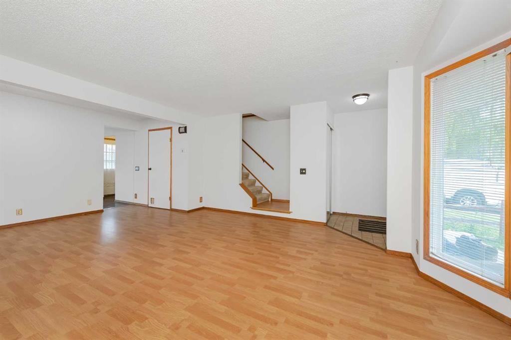 78 Queen Anne Close Se, Calgary, AB - Indoor Photo Showing Other Room