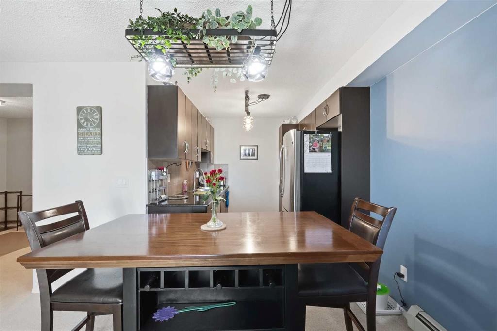 2409-60 Panatella Street, Calgary, AB - Indoor Photo Showing Dining Room