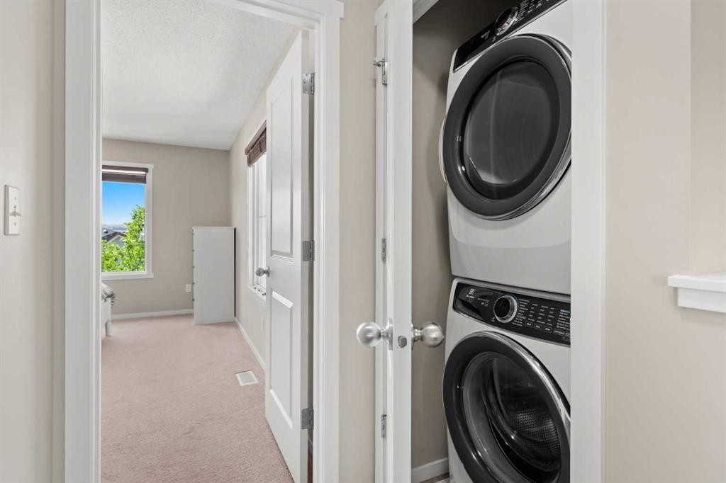 58 Evansview Road Nw, Calgary, AB - Indoor Photo Showing Laundry Room