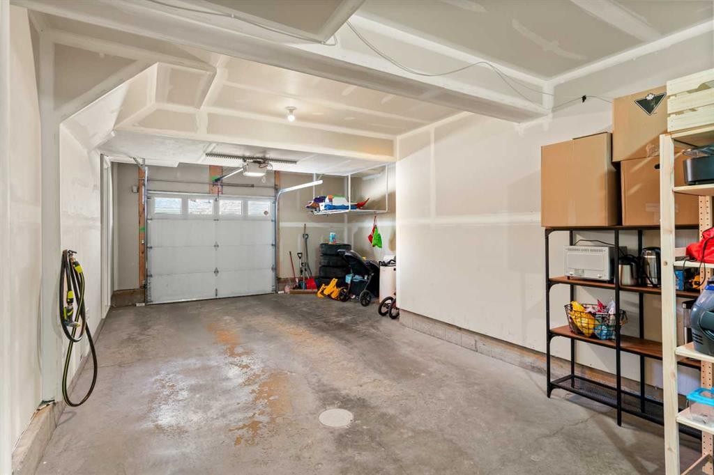 58 Evansview Road Nw, Calgary, AB - Indoor Photo Showing Garage