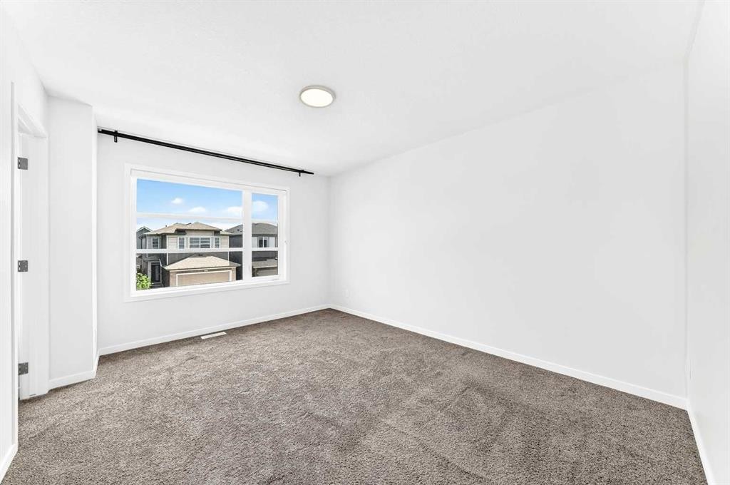 41 Corner Glen Row Ne, Calgary, AB - Indoor Photo Showing Other Room