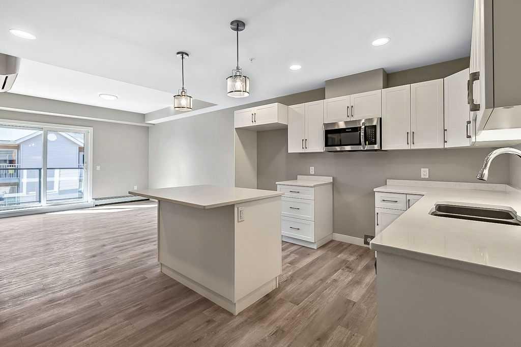 201-101 Willowridge Drive, Diamond Valley, AB