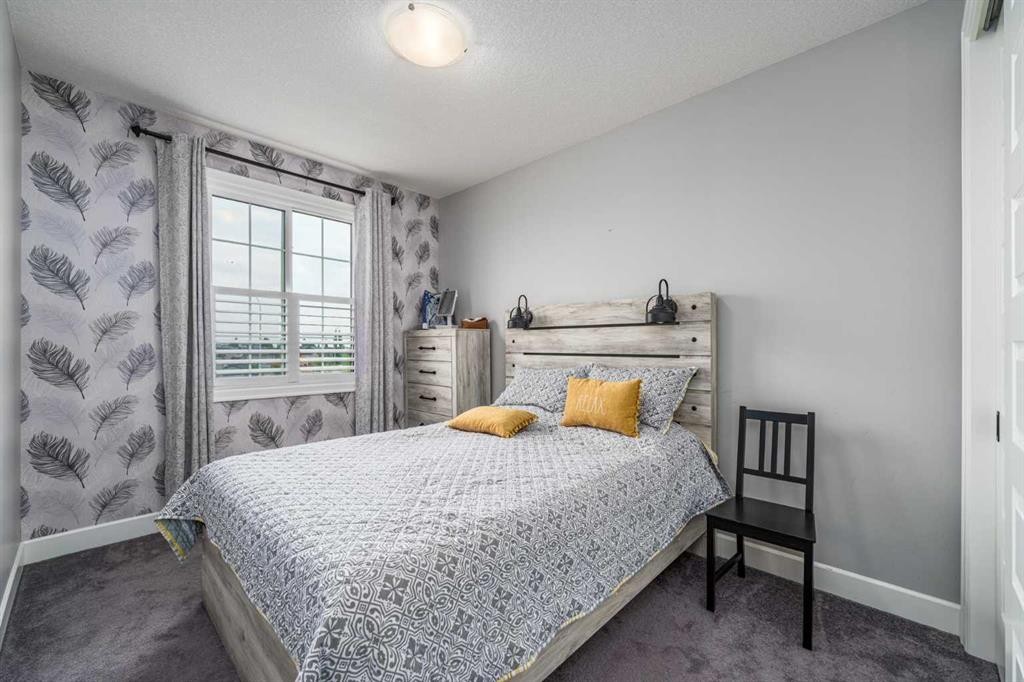46 Yorkstone Way Sw, Calgary, AB - Indoor Photo Showing Bedroom