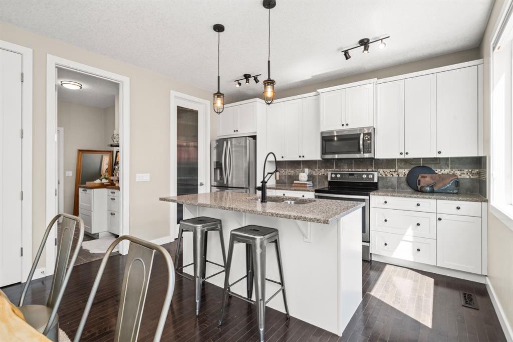 172 Mcivor Terrace, Chestermere, AB - Indoor Photo Showing Kitchen With Upgraded Kitchen