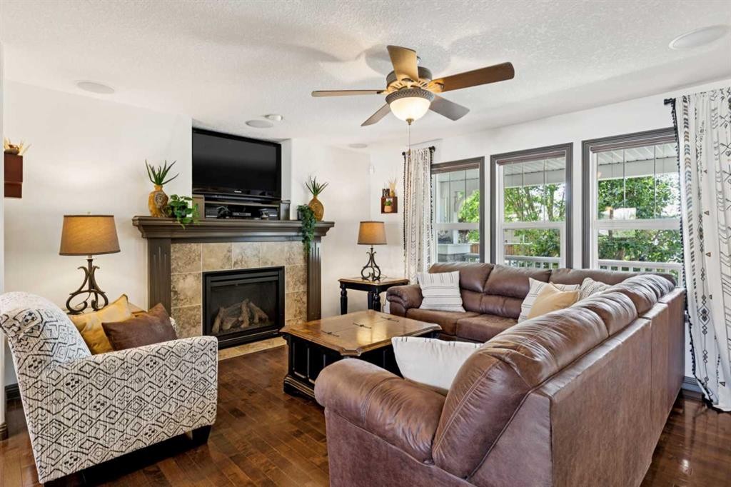 316 Prestwick Terrace Se, Calgary, AB - Indoor Photo Showing Living Room With Fireplace