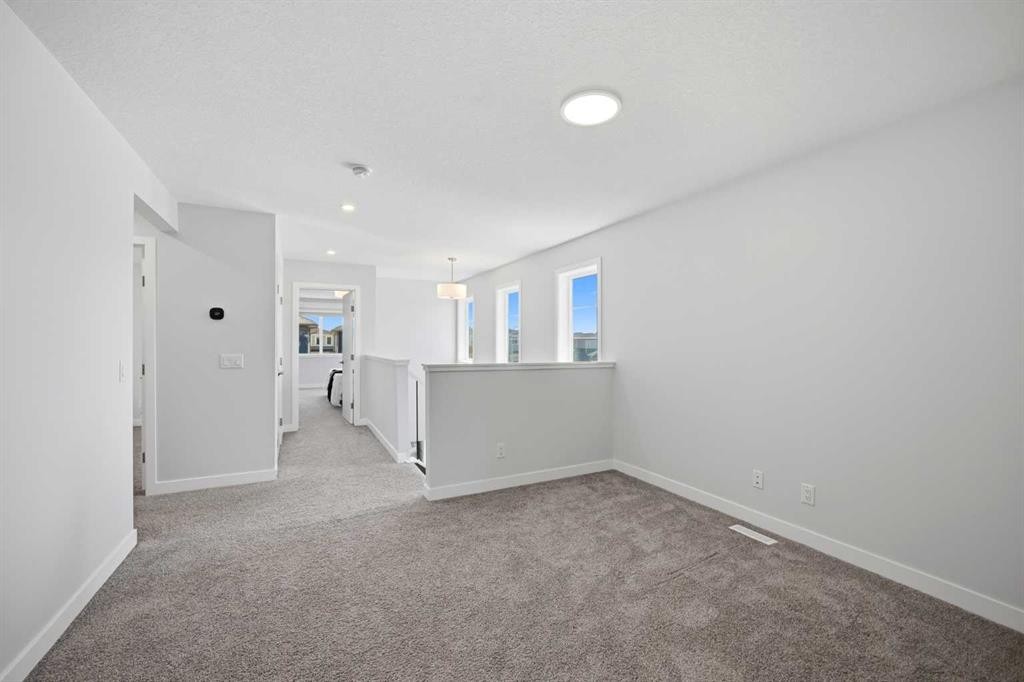 114 Corner Meadows Grove Ne, Calgary, AB - Indoor Photo Showing Other Room