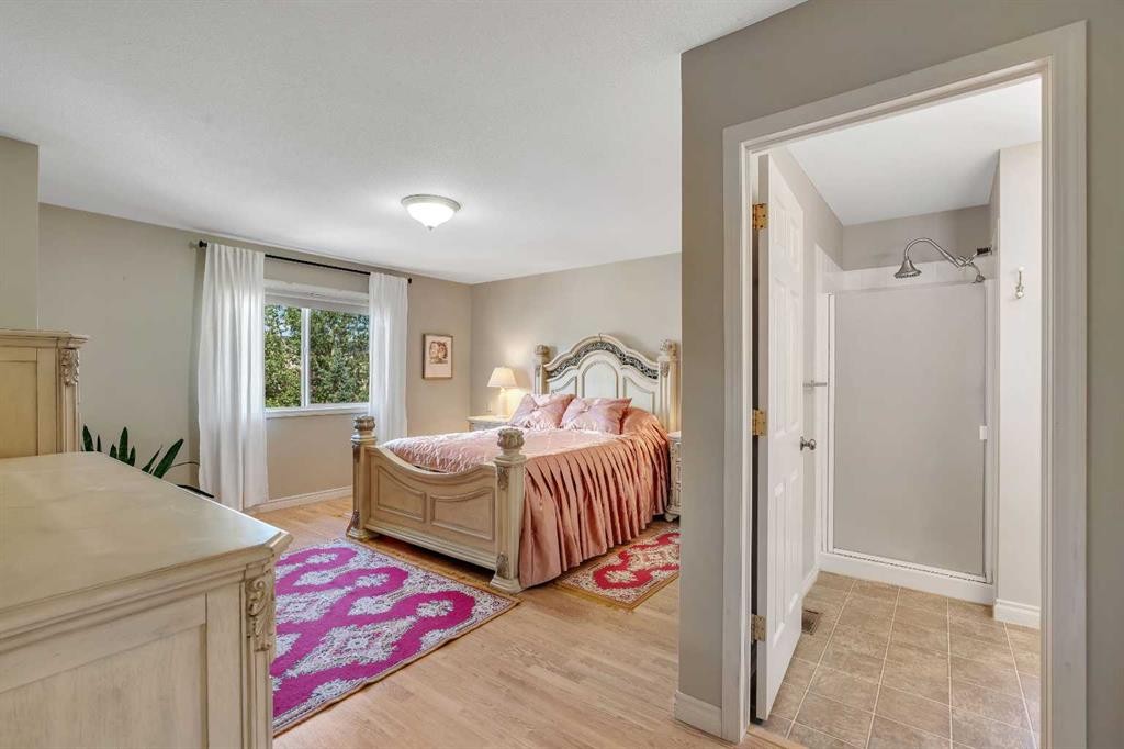 84 Willowbrook Crescent Nw, Airdrie, AB - Indoor Photo Showing Bedroom