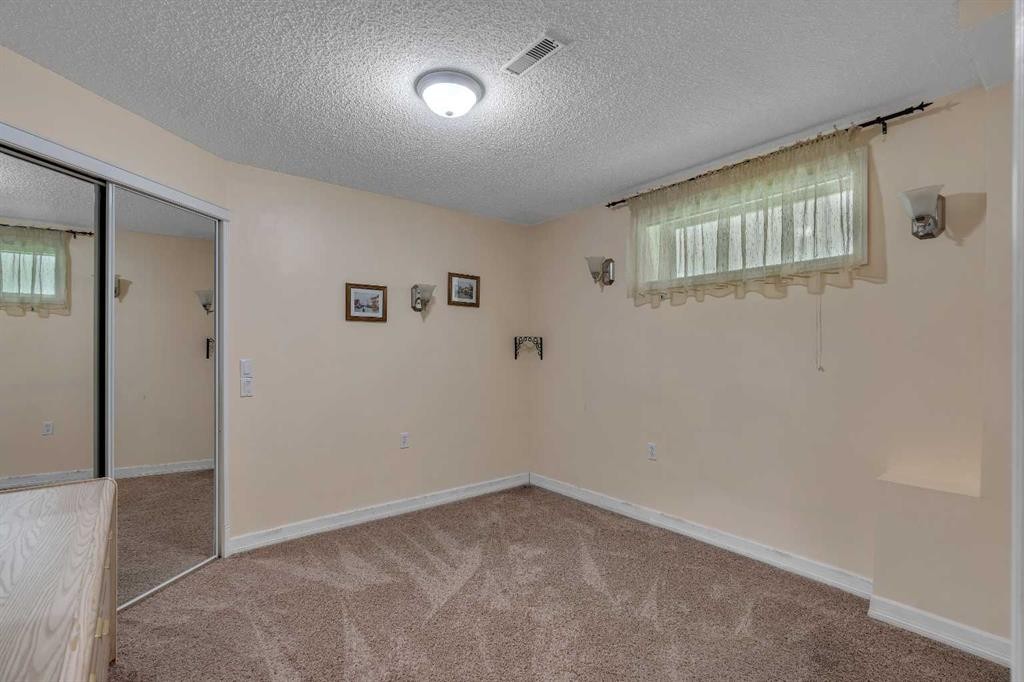 84 Willowbrook Crescent Nw, Airdrie, AB - Indoor Photo Showing Other Room