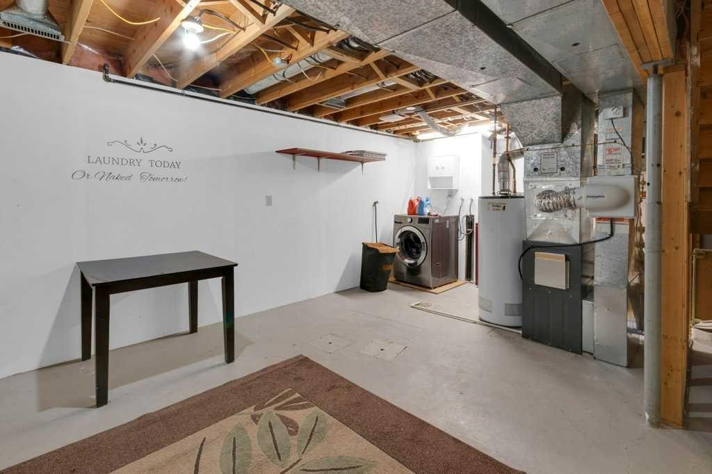 20 Midpark Gardens Se, Calgary, AB - Indoor Photo Showing Basement
