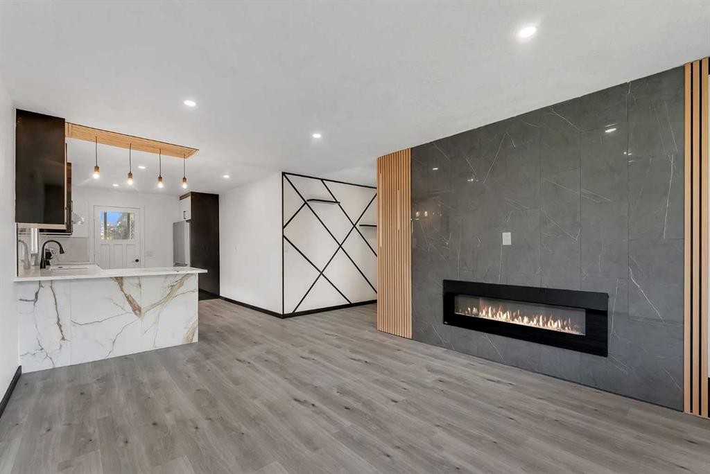4108 13 Avenue Ne, Calgary, AB - Indoor With Fireplace