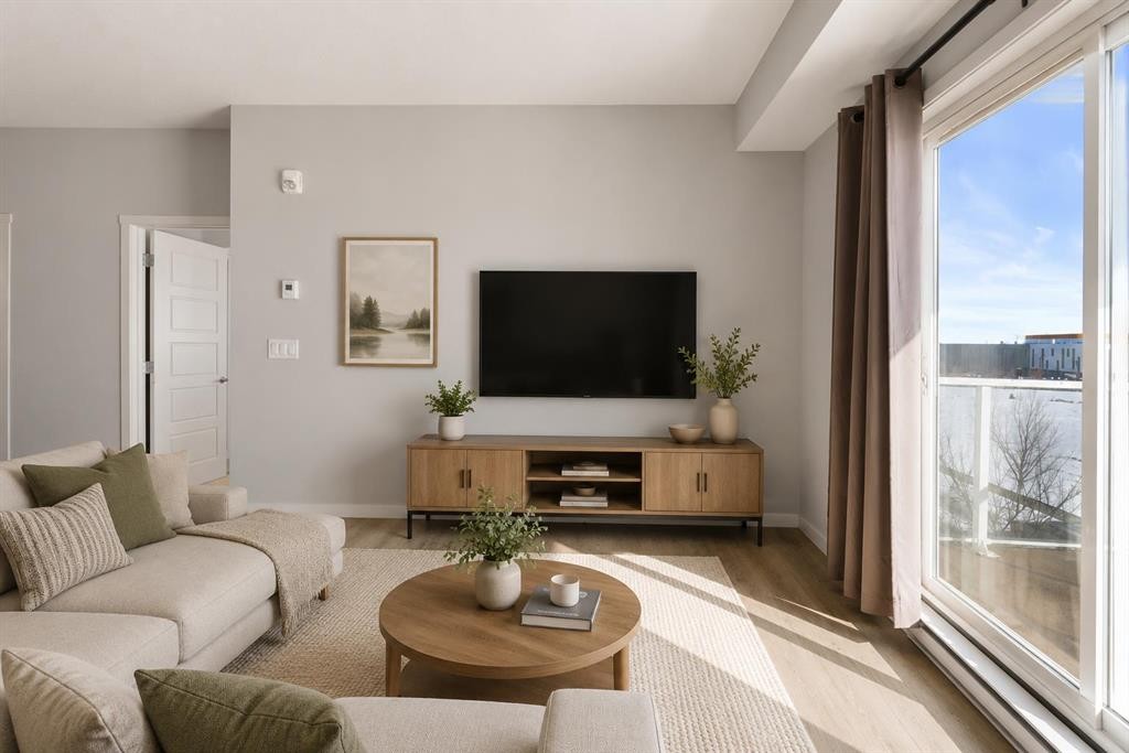 305-20 Seton Park Se, Calgary, AB - Indoor Photo Showing Living Room