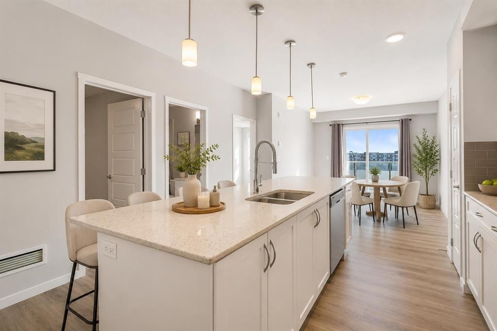 305-20 Seton Park Se, Calgary, AB - Indoor Photo Showing Kitchen With Double Sink With Upgraded Kitchen