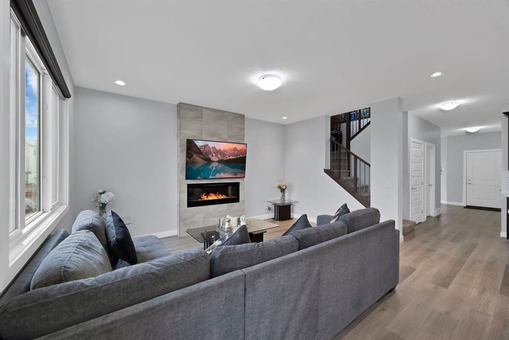 76 Red Embers Square Ne, Calgary, AB - Indoor Photo Showing Living Room With Fireplace