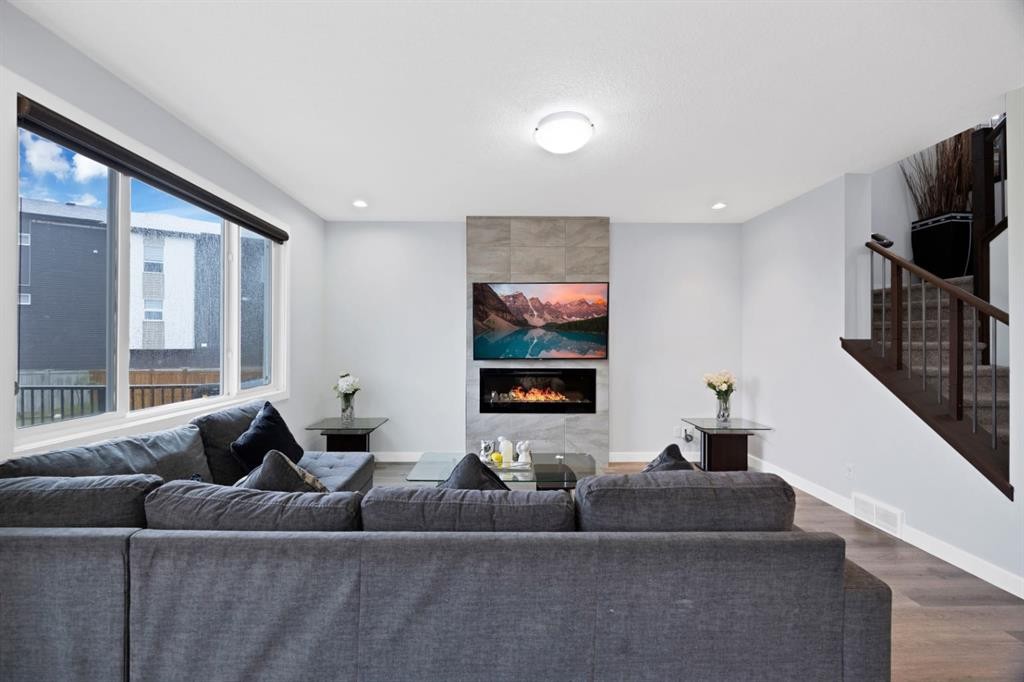 76 Red Embers Square Ne, Calgary, AB - Indoor Photo Showing Living Room With Fireplace