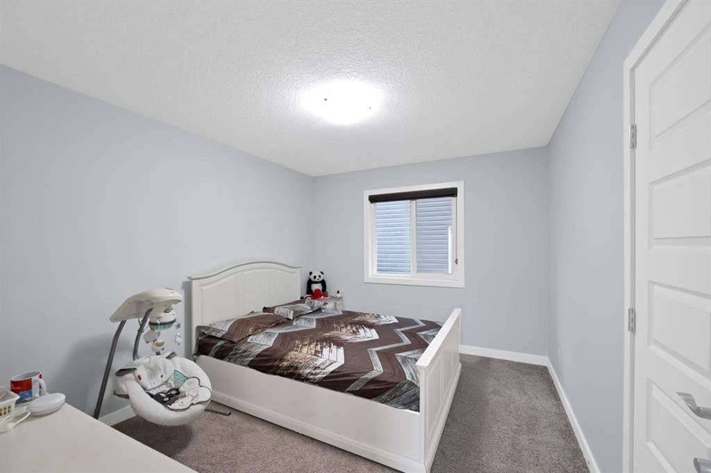 76 Red Embers Square Ne, Calgary, AB - Indoor Photo Showing Bedroom