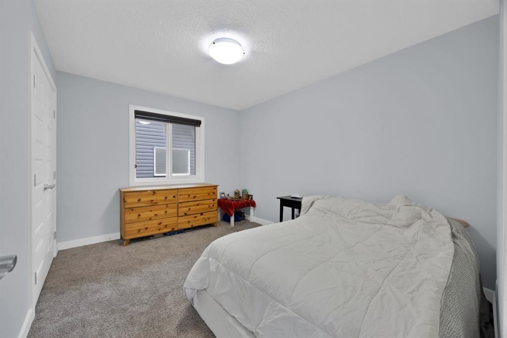 76 Red Embers Square Ne, Calgary, AB - Indoor Photo Showing Bedroom