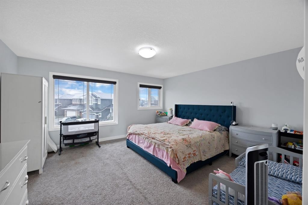 76 Red Embers Square Ne, Calgary, AB - Indoor Photo Showing Bedroom
