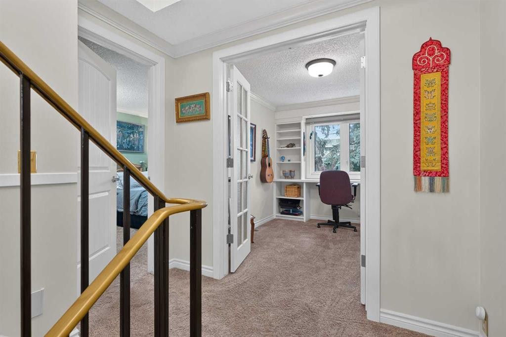12-140 Point Drive Nw, Calgary, AB - Indoor Photo Showing Other Room