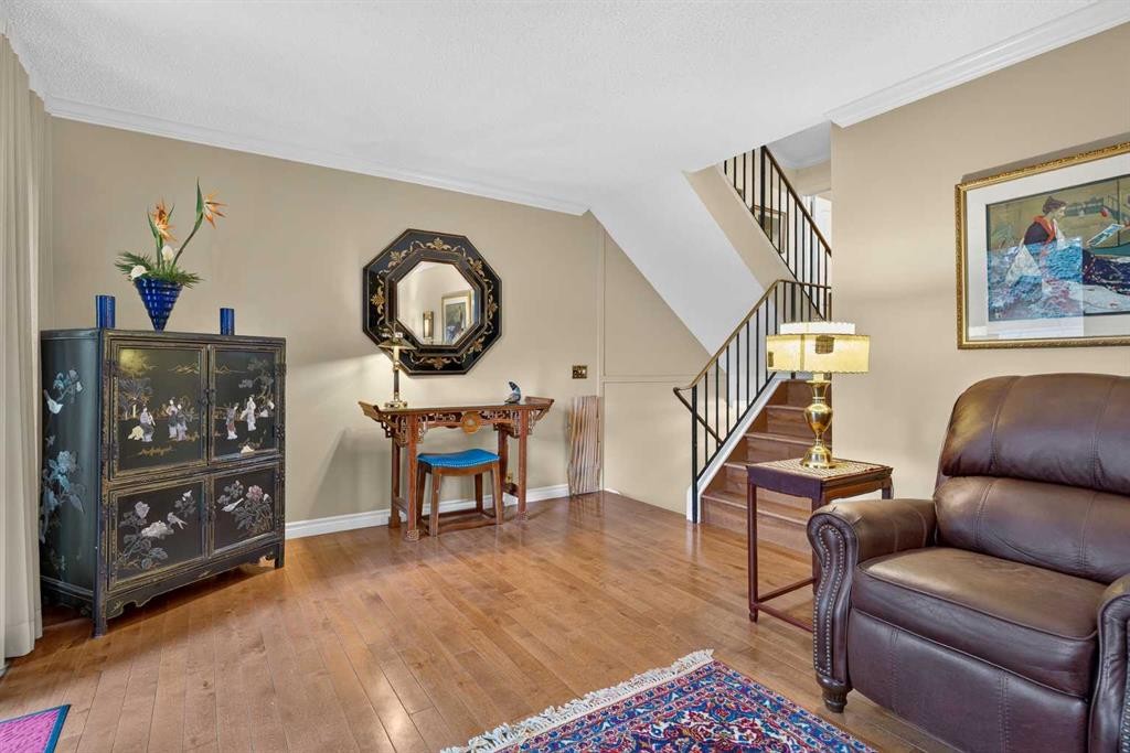 12-140 Point Drive Nw, Calgary, AB - Indoor Photo Showing Living Room