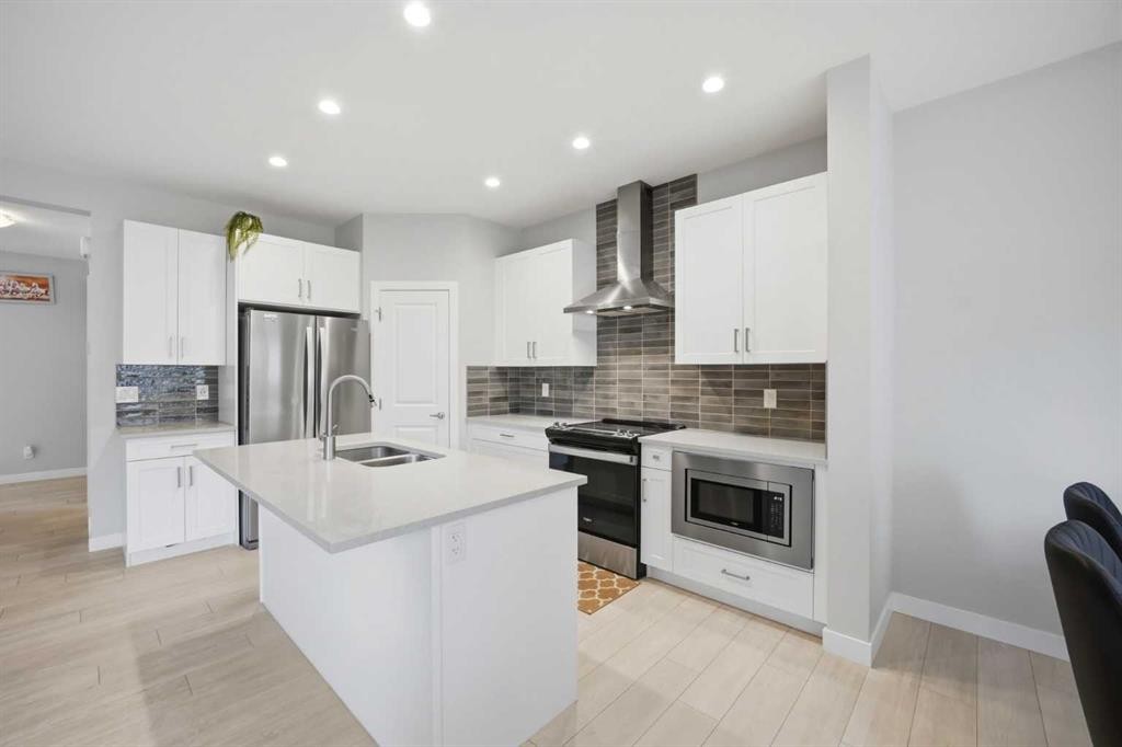 232 Cornerbrook Common Ne, Calgary, AB - Indoor Photo Showing Kitchen With Double Sink With Upgraded Kitchen