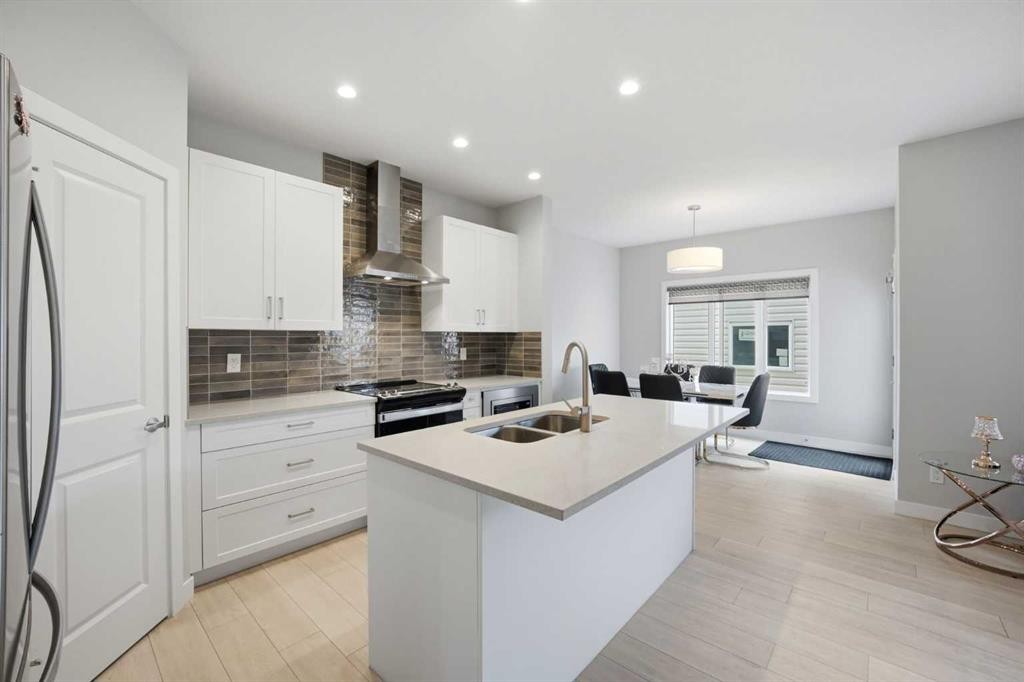 232 Cornerbrook Common Ne, Calgary, AB - Indoor Photo Showing Kitchen With Double Sink With Upgraded Kitchen