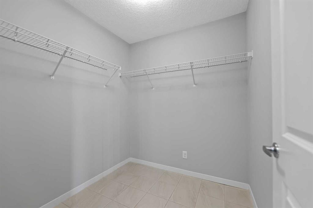 209 Harvest Hills Common Ne, Calgary, AB - Indoor With Storage
