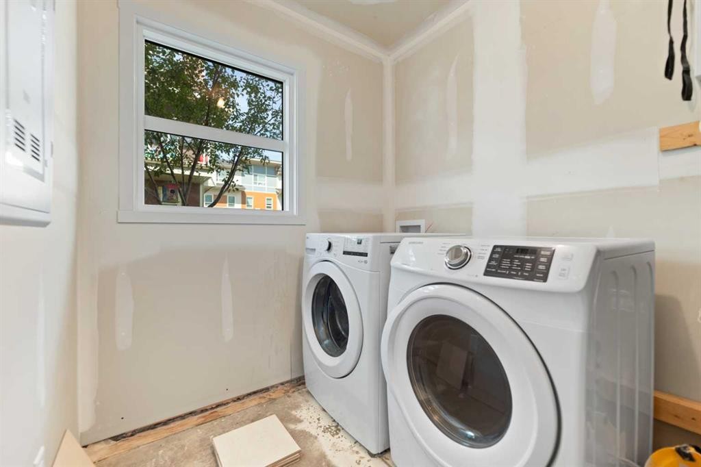 209 Harvest Hills Common Ne, Calgary, AB - Indoor Photo Showing Laundry Room