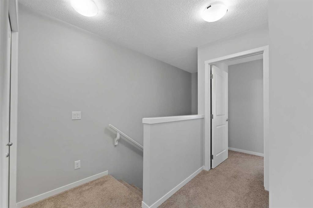 209 Harvest Hills Common Ne, Calgary, AB - Indoor Photo Showing Other Room