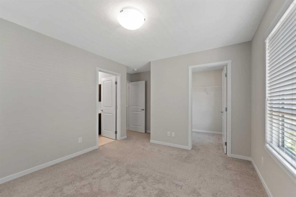 209 Harvest Hills Common Ne, Calgary, AB - Indoor Photo Showing Other Room
