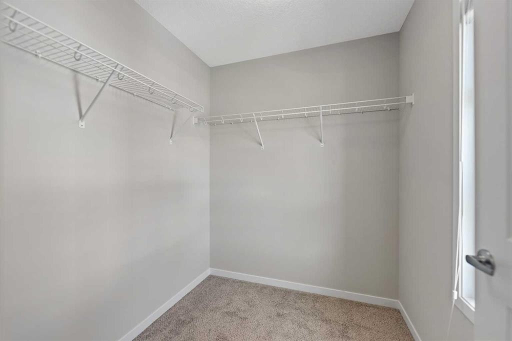 209 Harvest Hills Common Ne, Calgary, AB - Indoor With Storage
