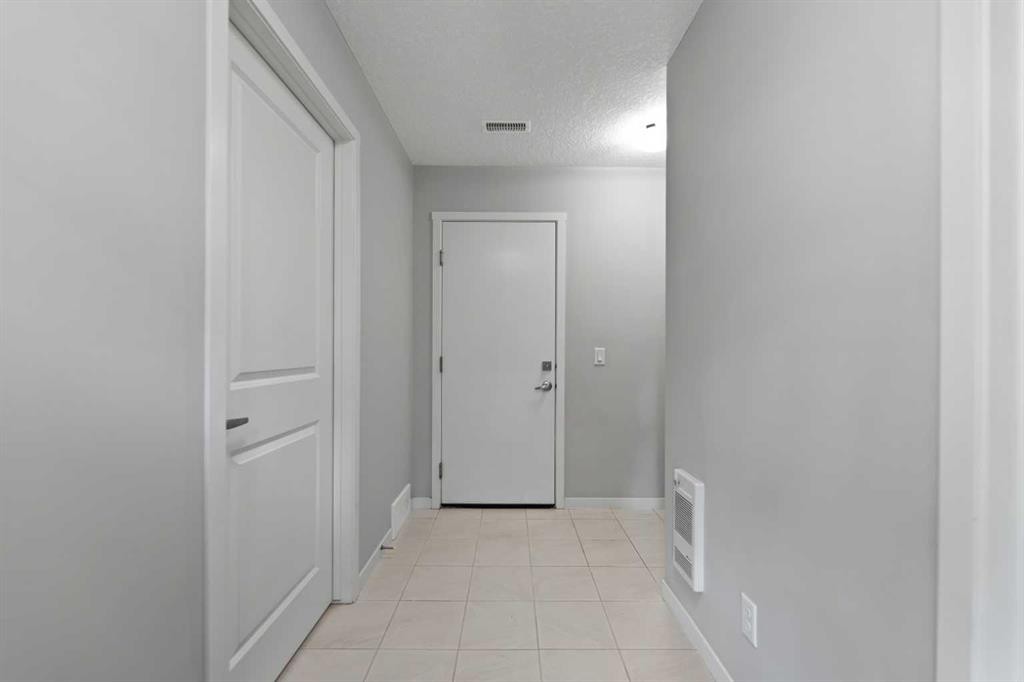 209 Harvest Hills Common Ne, Calgary, AB - Indoor Photo Showing Other Room