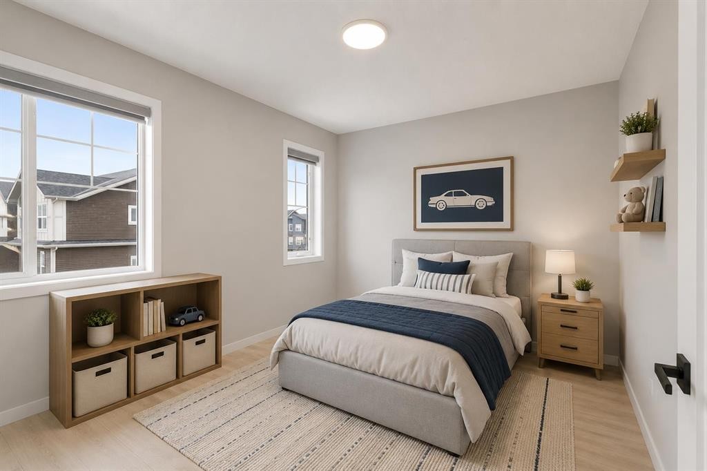 22 Edith Manor Nw, Calgary, AB - Indoor Photo Showing Bedroom
