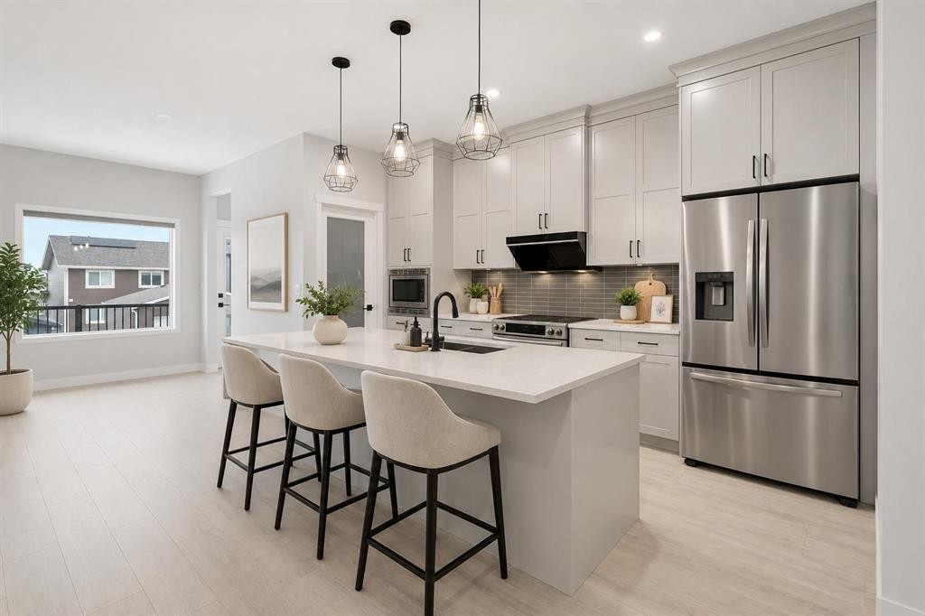 22 Edith Manor Nw, Calgary, AB - Indoor Photo Showing Kitchen With Upgraded Kitchen