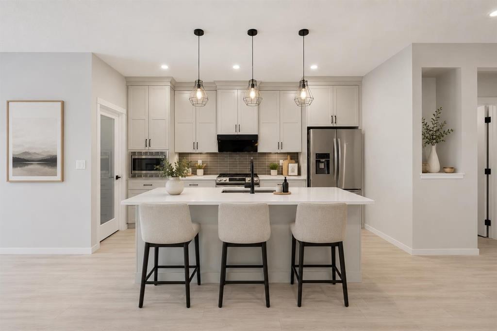 22 Edith Manor Nw, Calgary, AB - Indoor Photo Showing Kitchen With Upgraded Kitchen