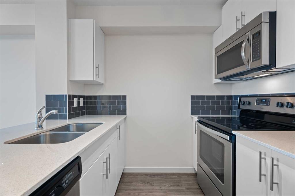 2404-181 Skyview Ranch Manor Ne, Calgary, AB - Indoor Photo Showing Kitchen With Stainless Steel Kitchen With Double Sink