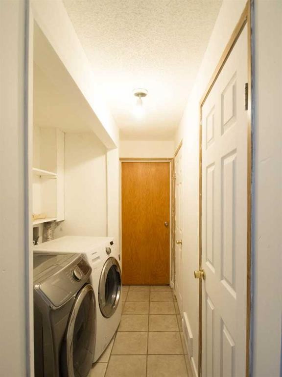 196 Fonda Drive Se, Calgary, AB - Indoor Photo Showing Laundry Room