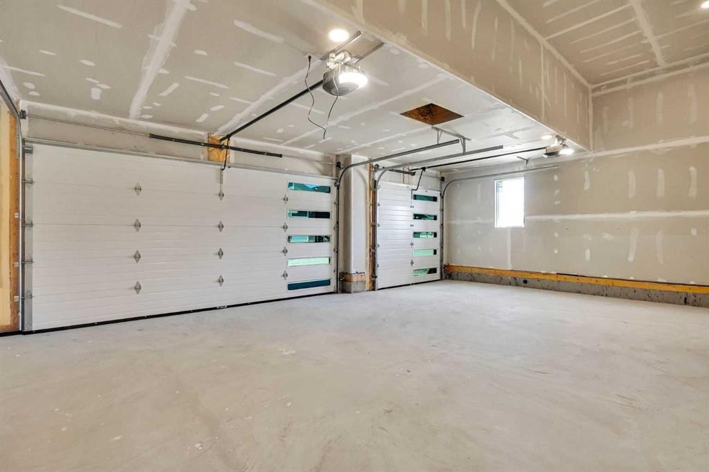 287 Waterford Road, Chestermere, AB - Indoor Photo Showing Garage