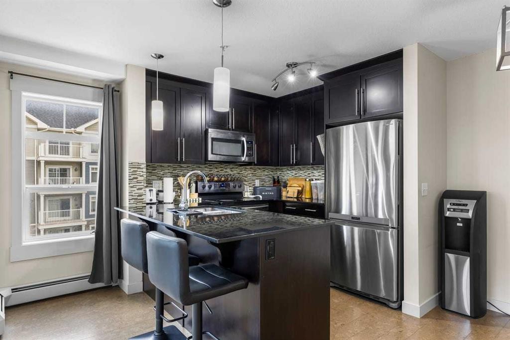 3308-155 Skyview Ranch Way Ne, Calgary, AB - Indoor Photo Showing Kitchen With Stainless Steel Kitchen With Upgraded Kitchen