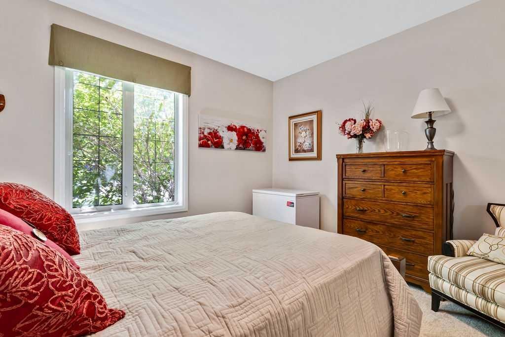 2110-15 Sunset Square, Cochrane, AB - Indoor Photo Showing Bedroom