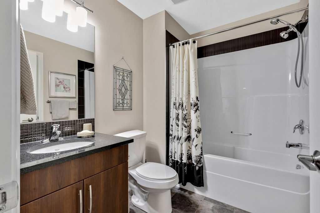 2110-15 Sunset Square, Cochrane, AB - Indoor Photo Showing Bathroom