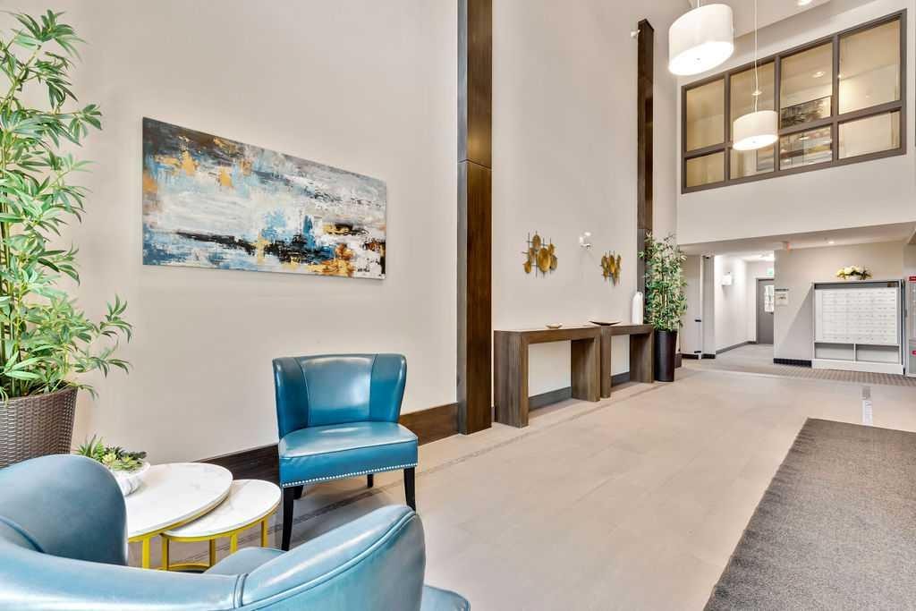2110-15 Sunset Square, Cochrane, AB - Indoor Photo Showing Other Room